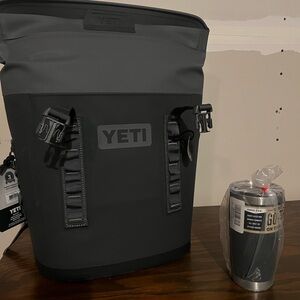 YETI BUNDLE: Black and Gray Backpack Cooler and travel tumbler. Tags still on